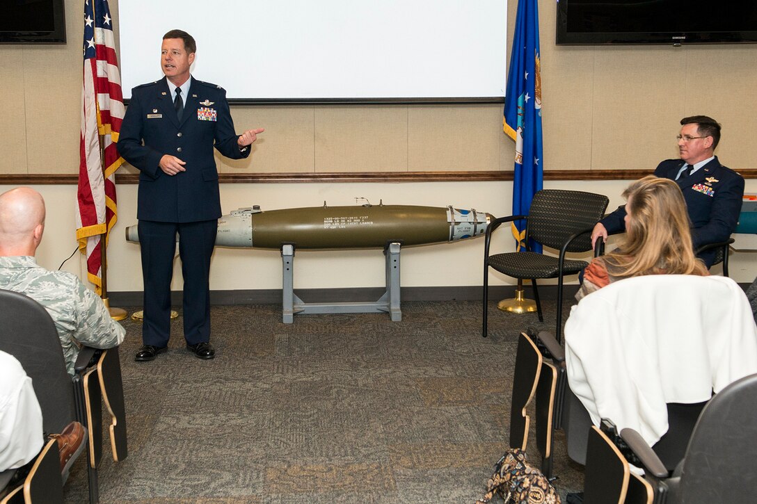 U.S. Air Force Col. Keith Schultz, 307th Operations Group commander, speaks during a retirement ceremony for Lt. Col. Ronald Polomoscanik, Nov. 2, 2014, Barksdale Air Force Base, La. Polomoscanik is the Director of Operations for the 343rd Bomb Squadron and a B-52 radar navigator. (U.S. Air Force photo by Master Sgt. Greg Steele/Released)