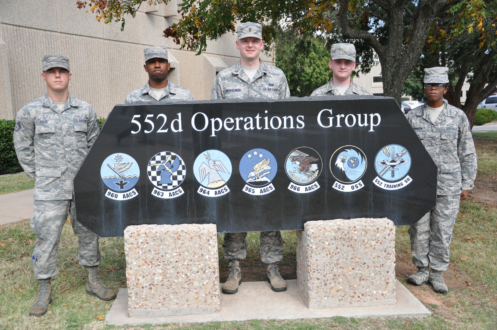 From left, Staff Sgt. Matthew Fulce, Airman 1st Class Frederick Thomas, 2nd Lt. Dawid Grzybowski, Airman 1st Class Ryan O’Gallager and Airman 1st Class Azelia Robinson are the first graduates of the new Air Force-wide E-3 Intelligence Initial Qualification Course. These five Airmen from the 552nd Air Control Wing graduated from the course Oct. 21. (Air Force photo by Darren D. Heusel)