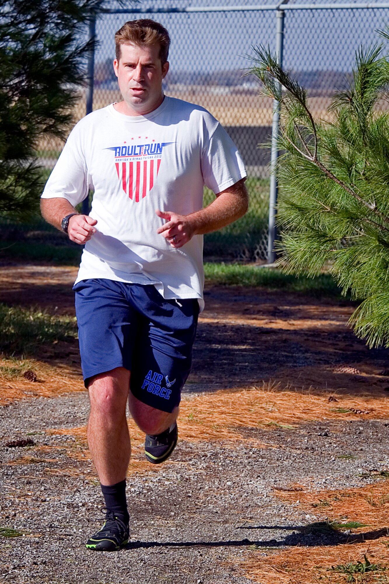 Zac Holmes, 74th Air Refueling Squadron inflight refueling trainee, maintains a steady pace during a 10K race at Grissom Air Reserve Base, Ind., Nov. 5, 2014. Grissom routinely holds runs and events to promote esprit de corps and physical fitness. (U.S. Air Force photo/Tech. Sgt. Douglas Hays)