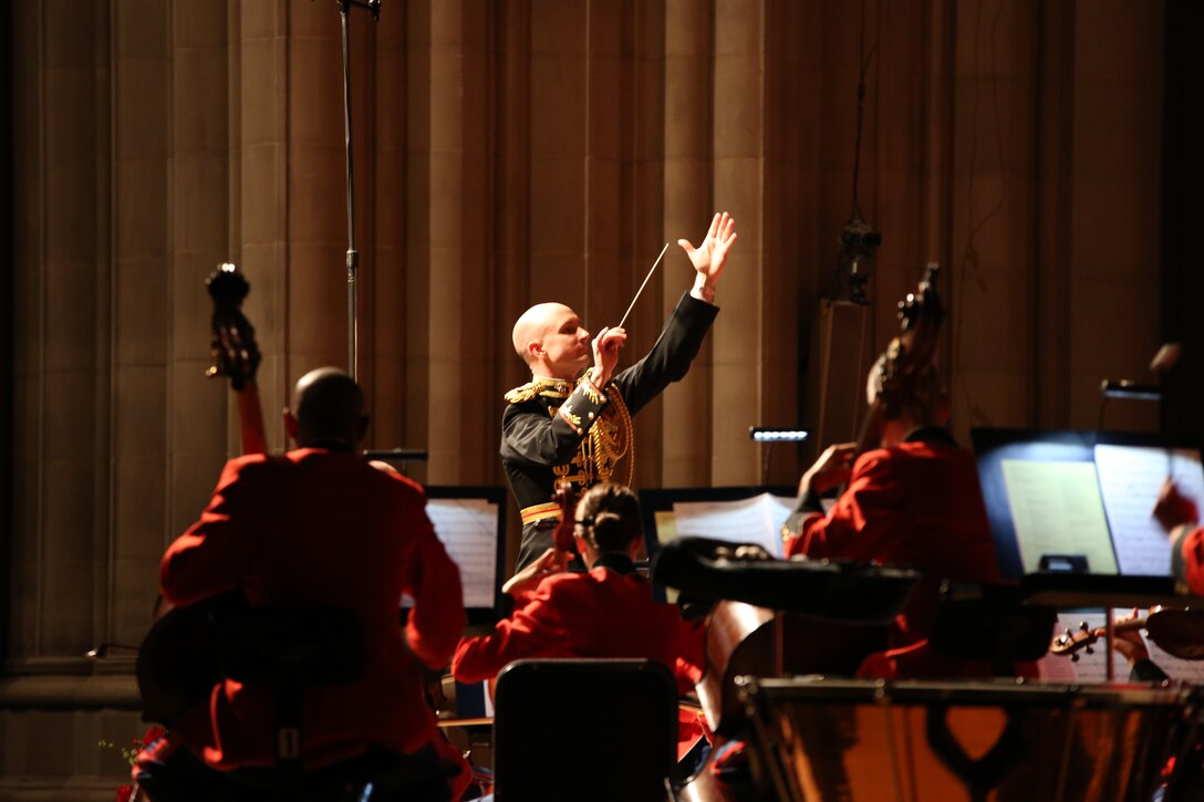 On Nov. 7, 2014, the Marine Chamber Orchestra and the Washington National Cathedral Choir performed a concert titled “Letters from War: A Tribute to Veterans” at the Washington National Cathedral. In addition to works such as John Williams’ Liberty Fanfare, The Lord is my Shepherd by John Rutter, and the Battle Hymn of the Republic, the moving tribute also included readings from letters sent from the font lines during the major conflicts of the past 100 years. Pictured, Director Lt. Col. Jason K. Fettig. (U.S. Marine Corps photo by Gunnery Sgt. Amanda Simmons/released) 