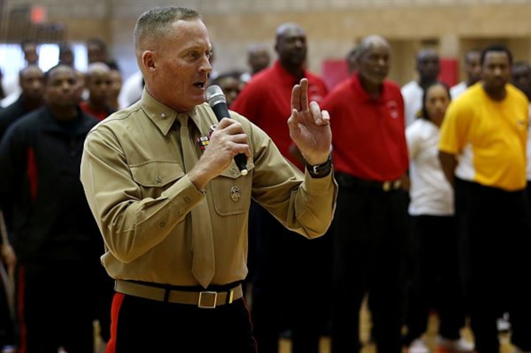 Brig. Gen. Edward Banta speaks at the opening ceremony of the Armed Forces Basketball Championship at the Paige Fieldhouse, Nov. 7. The championship consists of a men and womens team from each of the four branches. The tournament is from Nov. 7-13 and the best players from the tournament will be selected to play on the All-Armed Forces Team in December in Belgium. Banta is the Commanding General of Marine Corps Installations West-Marine Corps Base Camp Pendleton. (Photo by Cpl. Keenan Zelazoski)