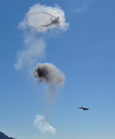 A C-45 Expediter participates in the Legacy Bombers show, which included pyrotechnics, at the Nellis Open House, Nov. 7, 2014, at Nellis Air Force Base, Nev. 4,526 of these aircraft were built for the Army Air Forces between 1939 and 1945. (U.S. Air Force photo by Senior Master Sgt. Cecilio Ricardo)