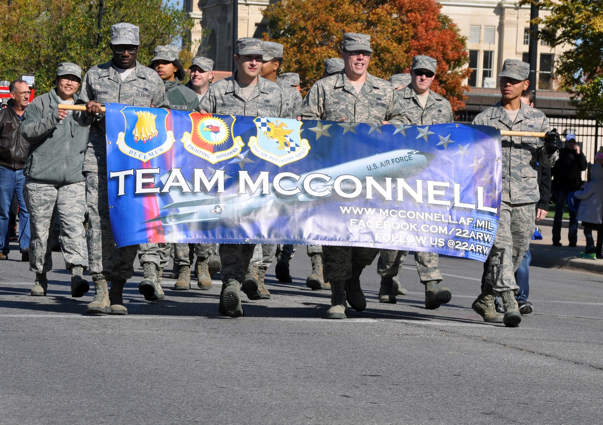 Several members of Team McConnell participated in the 2014 Veterans Day Parade in downtown Wichita, Kan., Nov. 8, 2014. The Total Force representation from the active duty 22nd Air Refueling Wing and the Reserve 931st Air Refueling Group took part in the parade as a way to honor U.S. military veterans. (U.S. Air Force photo by Capt. Zach Anderson)