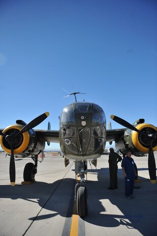 A B-25J Mitchell bomber sits on static display at the Nellis Open House Nov 7, 2014, at Nellis Air Force Base, Nev. The B-25 was used for high- and low-level bombing, strafing, photo-reconnaissance, submarine patrol and even as a fighter. It was also distinguished as the aircraft that completed the historic raid over Tokyo in 1942. (U.S. Air Force photo by Tech. Sgt. Allen)