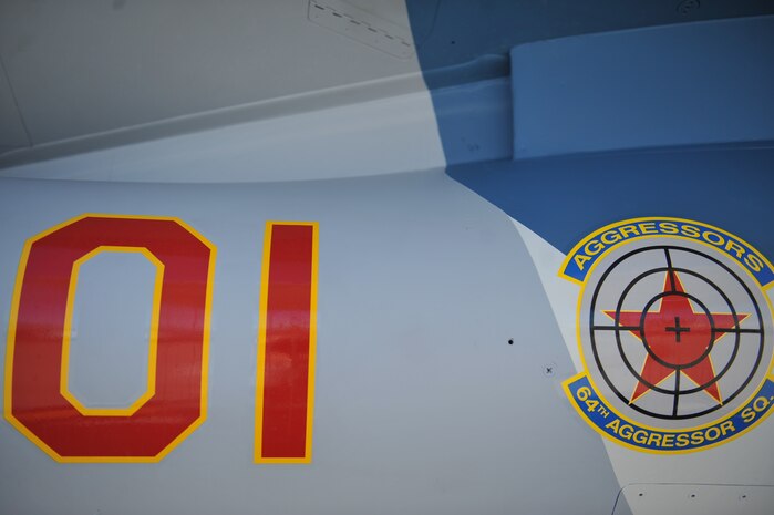 An F-16 Fighting Falcon sits as a static display at the Nellis Open House Nov 7, 2014, at Nellis Air Force Base, Nev. The 64th Aggressor Squadron prepares the combat air forces, joint and allied aircrews for tomorrow's victories with challenging and realistic threat replication, training, academics and feedback. (U.S. Air Force photo by Tech. Sgt. Sanjay Allen)