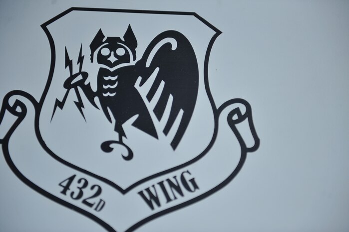 An MQ-9 Reaper sits as a static display at the Nellis Open House Nov. 7, 2014, at Nellis Air Force Base, Nev. The 432nd Wing consists of combat-ready Airmen who fly the MQ-1 Predator and MQ-9 Reaper remotely piloted aircraft in direct support of the joint forces warfighter. (U.S. Air Force photo by Tech. Sgt. Sanjay Allen)