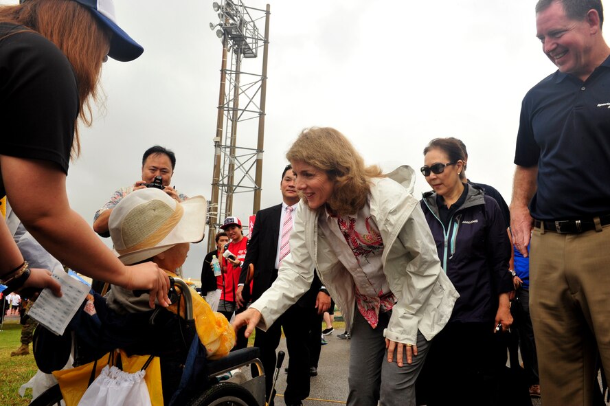 U.S. Ambassador Caroline Kennedy talks with a Kadena Special Olympics athlete, Kadena Air Base, Japan, Nov. 8, 2014. The event is sponsored by the 18th Wing and the Friends of Kadena Special Olympics in partnership with the Okinawa Prefectural Government, Okinawa City, Kadena Town, Chatan Town and all U.S. military services on island. (U.S. Air Force photo by Naoto Anazawa/Released)
