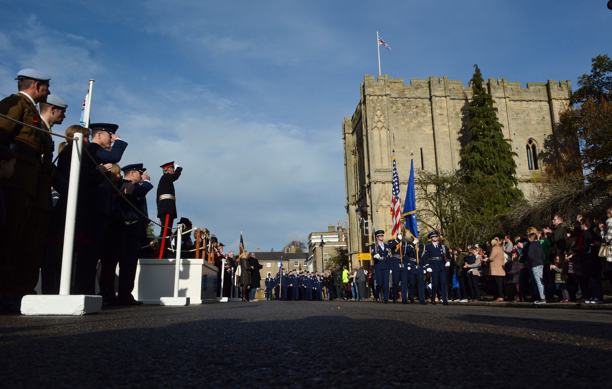 U.S. Air Force Airmen from RAF Mildenhall and RAF Lakenheath march during a Remembrance Day parade Nov. 9, 2014, in Bury St. Edmunds in Suffolk, England. The parade participants also included members of the Royal Air Force, civic leaders, military cadets and others. Each year, on the second Sunday of November, U.K. citizens pay homage to those who died in the two world wars and other military conflicts. (U.S. Air Force photo by Staff Sgt. Micaiah Anthony/Released)
