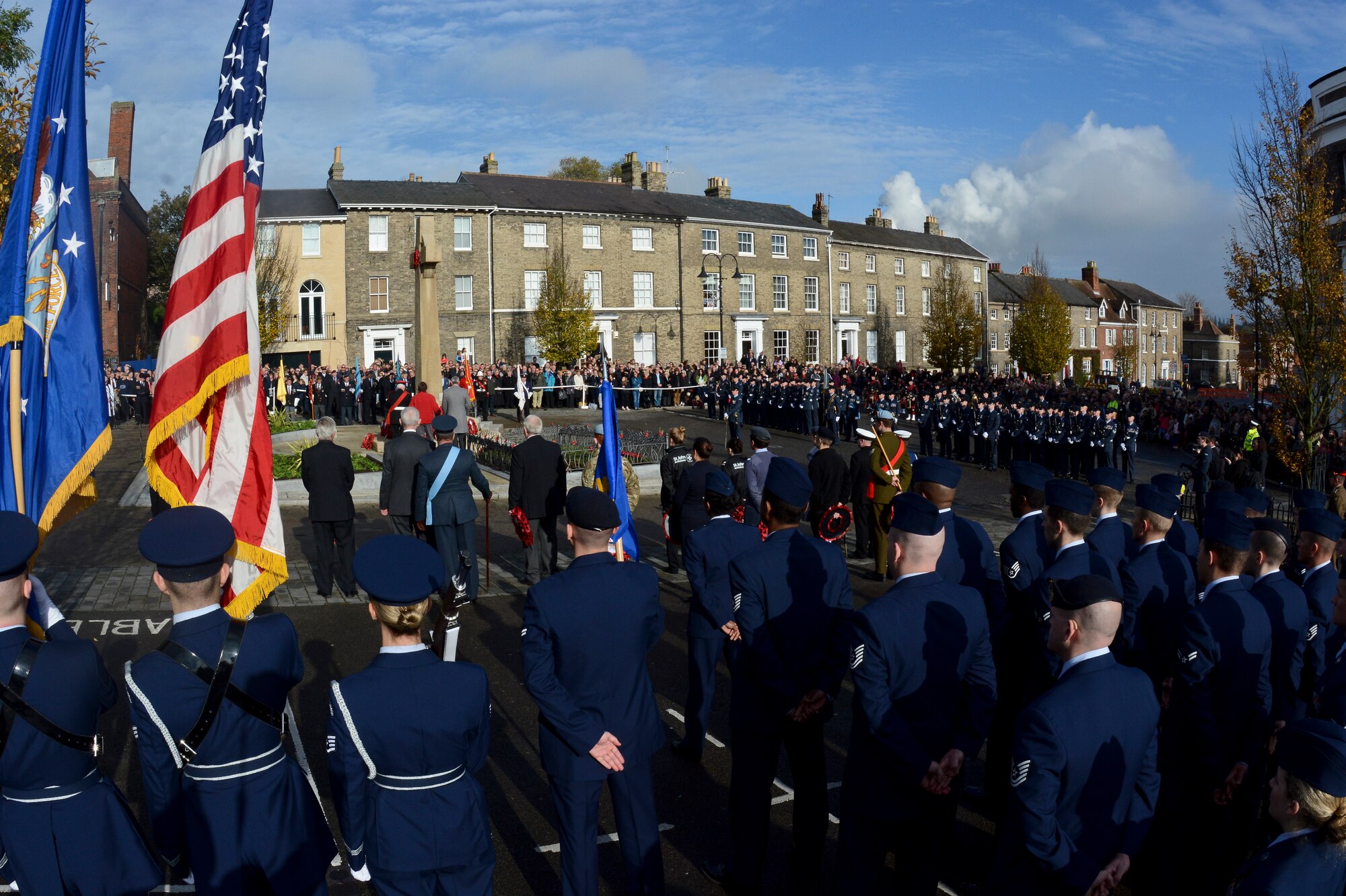 U.S. Air Force Airmen from RAF Mildenhall and RAF Lakenheath stand at parade rest during a Remembrance Day ceremony Nov. 9, 2014, in Bury St. Edmunds in Suffolk, England. Remembrance Day is held in November each year to honor members of the armed forces who have died in the line of duty. The day was originally named Armistice Day after World War I, which ended at the 11th hour on the 11th day of the 11th month in 1918. The day was changed to Remembrance Day after World War II to honor all of the men and women who serve. (U.S. Air Force photo by Staff Sgt. Micaiah Anthony/Released)