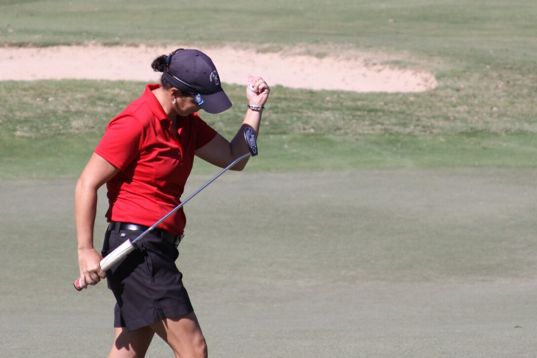 Air Force Maj. Linda Jeffery celebrates a birdie during her gold medal performance at the Armed Forces Golf Championship at Joint Base San Antonio-Randolph AFB, TX 5-10 November. Jeffery earns her sixth spot on the US Armed Forces roster as Team USA Competes in the Conseil International du Sport Militaire (CISM) World Military Golf Championship in Bahrain. Jeffery is the women's five-time gold medal champion at CISM.