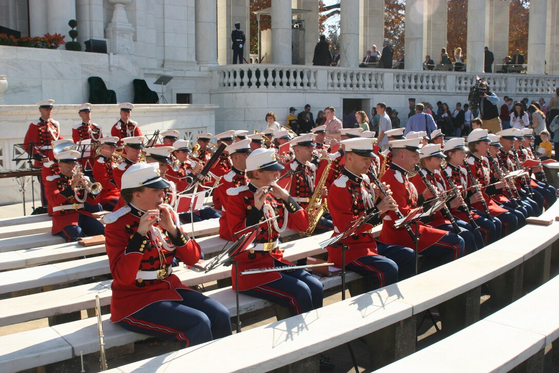 On Nov. 11, 2006, the Marine Band, conducted by Capt. Michelle Rakers, performed at Arlington National Cemetery's Memorial Amphitheater for the Veterans Day Observance attended by President George W. Bush. (U.S. Marine Corps photo by Staff Sgt. Brian Rust/released)