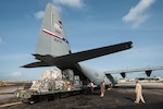 Aerial porters from the Kentucky Air National Guard’s 123rd Contingency Response Group load 8 tons of humanitarian aid and military supplies onto a U.S. Air Force C-130 aircraft at Léopold Sédar Senghor International Airport in Dakar, Senegal, Nov. 4, 2014. The aircraft and crew, from Dyess Air Force Base Texas, are deployed to Senegal as part of the 787th Air Expeditionary Squadron and will fly the cargo into Monrovia, Liberia, in support of Operation United Assistance, the U.S. Agency for International Development-led, whole-of-government effort to contain the Ebola virus outbreak in West Africa.