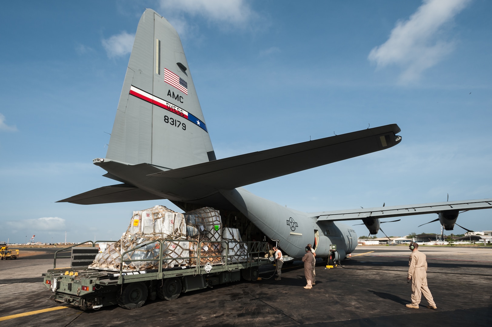 Aerial porters from the Kentucky Air National Guard’s 123rd Contingency Response Group load 8 tons of humanitarian aid and military supplies onto a U.S. Air Force C-130 aircraft at Léopold Sédar Senghor International Airport in Dakar, Senegal, Nov. 4, 2014. The aircraft and crew, from Dyess Air Force Base Texas, are deployed to Senegal as part of the 787th Air Expeditionary Squadron and will fly the cargo into Monrovia, Liberia, in support of Operation United Assistance, the U.S. Agency for International Development-led, whole-of-government effort to contain the Ebola virus outbreak in West Africa.