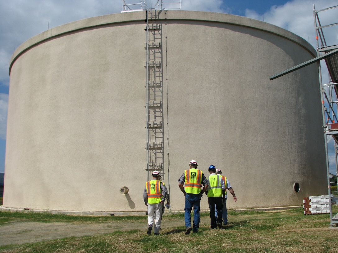 U.S. Army Corps of Engineers, Baltimore District, officials examine the supplemental two milliion gallon water storage tank on Fort Detrick, Md. 