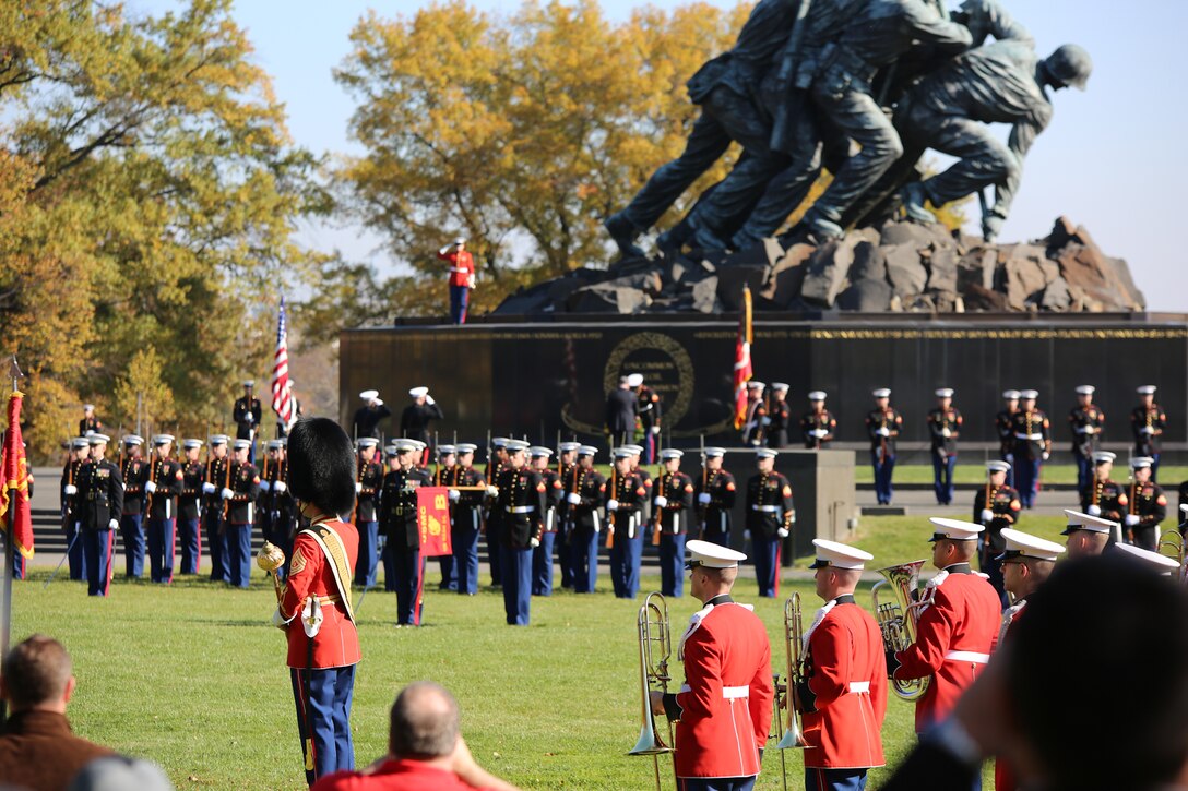 On Nov. 10, 2014, the Marine Band, led by Drum Major Master Sgt. Duane King, performed at the memorial ceremony commemorating the 239th anniversary of the United States Marine Corps at the Marine Corps War Memorial in Arlington, Va. Marine Corps Commandant Gen. Joseph Dunford Jr. and guest of honor Virginia Senator Tim Kaine spoke and layed a wreath in honor of all Marines who have given their lives in service of the country since 1775.  (U.S. Marine Corps photo by Master Sgt. Kristin duBois/released)