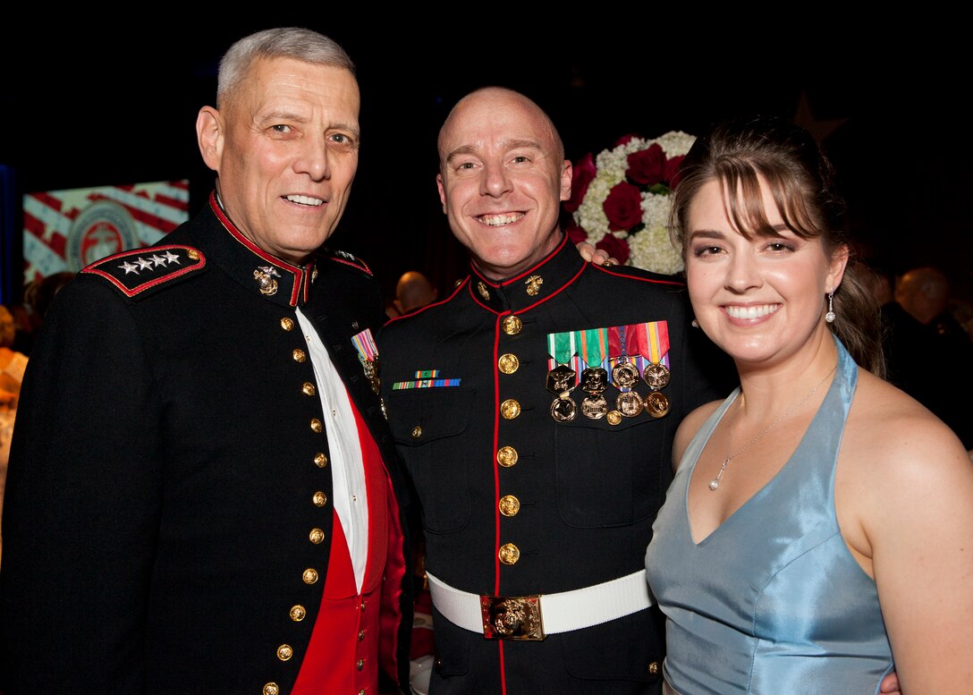 The Assistant Commandant of the Marine Corps, Gen. John M. Paxton, Jr., poses for a photo with guests during the Commandant's Birthday Ball at the Gaylord National Resort and Convention Center, National Harbor, Md., Nov. 8, 2014. (U.S. Marine Corps photo by Cpl. Tia Dufour/Released)