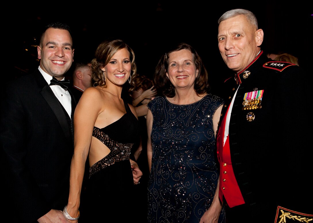 The Assistant Commandant of the Marine Corps, Gen. John M. Paxton, Jr., poses for a photo with guests during the Commandant's Birthday Ball at the Gaylord National Resort and Convention Center, National Harbor, Md., Nov. 8, 2014. (U.S. Marine Corps photo by Cpl. Tia Dufour/Released)