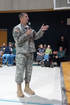 Tulsa District, U.S. Army Corps of Engineers commander, Col. Richard A. Pratt, speaks to faculty, students and veterans during the annual Veterans Day Assembly at R. J. Wells Middle School in Catoosa, Oklahoma, Nov. 10. Col. Pratt encouraged students to consider military service and studies that would prepare them for careers in Science, Technology, Engineering and Math (STEM).