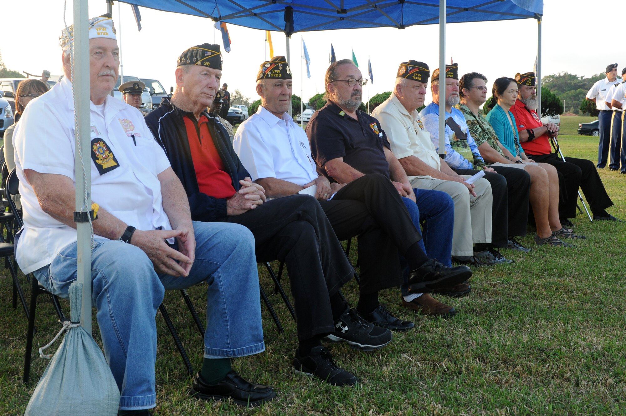 Military veterans listen while each service branch creed is recited during a Veterans Day ceremony at Kadena Air Base, Japan, Nov. 11, 2014. Veterans Day is a holiday dedicated to honoring those who have served in the United States military. (U.S. Air Force photo by Airman 1st Class Stephen G. Eigel/Released)