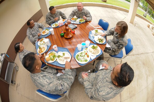 U.S. Air Force Chief Master Sgt. James W. Hotaling, command chief master sergeant of the Air National Guard, shares the lunch hour with Airmen of the 154th Wing, Hawaii Air National Guard, at Joint Base Pearl Harbor Hickam on Nov. 9, 2014. The luncheon provided an opportunity for the Airmen to share their various experiences with the Guard. (U.S. Air National Guard photo by Airman 1st Class Robert Cabuco)