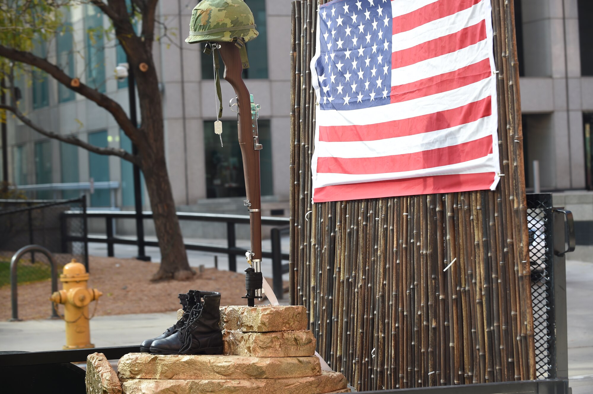 Military boots, a replica rifle and dog tags represent POW/MIA military members during the Veteran’s Day Parade, hosted by the Colorado Veterans Project, Nov. 8, 2014, in Denver. The parade consisted of more than 75 groups honoring American veterans by highlighting each American war, beginning with the Revolutionary War and ending with Operation Iraqi Freedom. (U.S. Air Force photo by Airman 1st Class Samantha Saulsbury/Released)