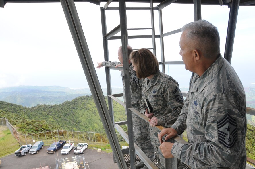 U.S. Air Force Chief Master Sgt. James W. Hotaling, command chief master sergeant of the Air National Guard, gets a 360 degree view of the island of Oahu from the Mount Kaala Air Force Station, Hawaii on Nov. 6, 2014. The station, located at the highest point on the island, provides 24 hour surveillance of the airspace in and around the Hawaiian islands. (U.S. Air National Guard photo by Airman 1st Class Robert Cabuco)