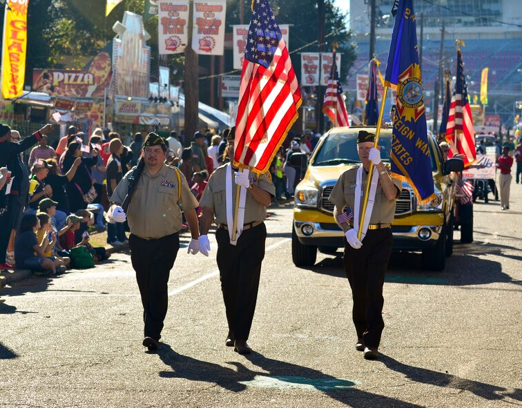 Members of Veterans of Foreign Wars march during the 2014 Veterans Day parade at Shreveport, La., Nov. 9, 2014. The Veterans of Foreign Wars was founded Sept. 29, 1899, by Spanish-American War veterans of the 17th Infantry Regiment, Ohio National Guard, with the purpose to foster camaraderie among United States veterans of overseas conflicts. (U.S. Air Force photo/Airman 1st Class Mozer Da Cunha)