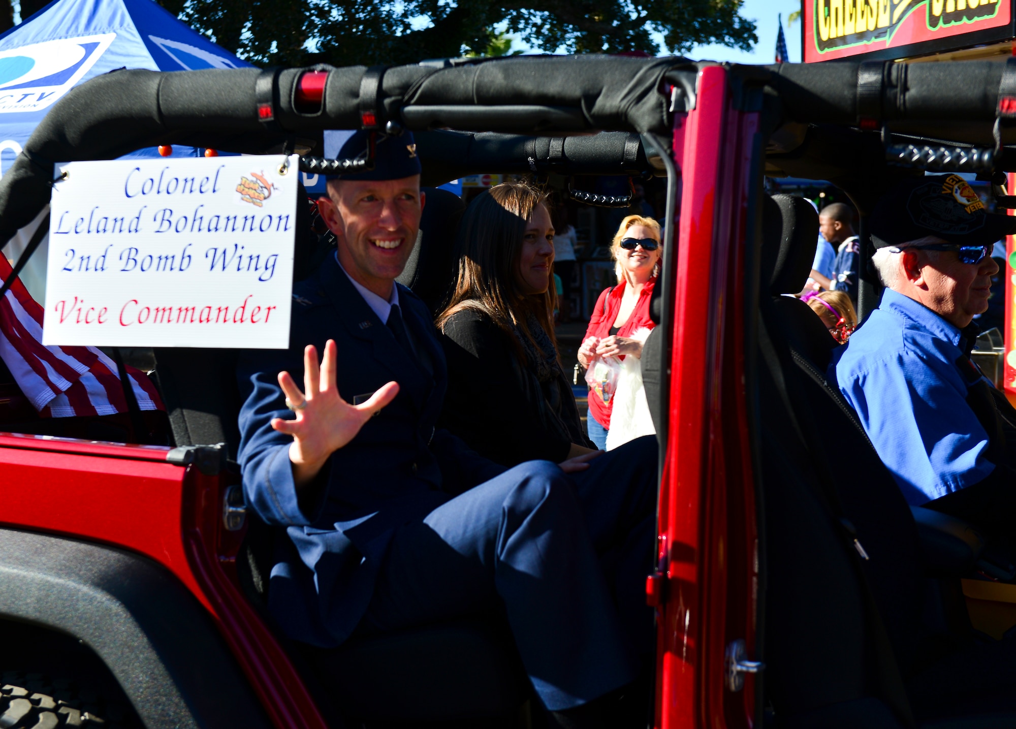 Col. Leland Bohannon, 2nd Bomb Wing vice commander, waves at a crowd during the 2014 Veterans Day parade at Shreveport, La., Nov. 9, 2014. June 1, 1954, President Eisenhower declared Nov. 11 a day of celebration to honor America's veterans for patriotism, love of country, willingness to serve and sacrifice for the common good. (U.S. Air Force photo/Airman 1st Class Mozer Da Cunha)