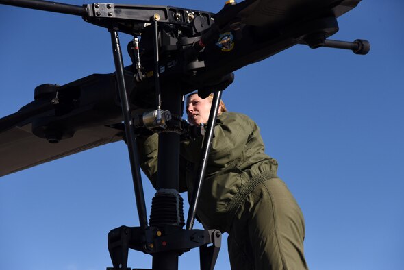 Tech. Sgt. Michelle Bresson, 40th Helicopter Squadron special missions aviator, performs a pre-flight inspection Nov. 5. Special Missions Aviator’s responsibilities typically include keeping the pilots advised of anything that is going on with the aircraft. If there are any malfunctions with the aircraft, the aviators are the system experts. (U.S. Air Force photo/Airman 1st Class Joshua Smoot)