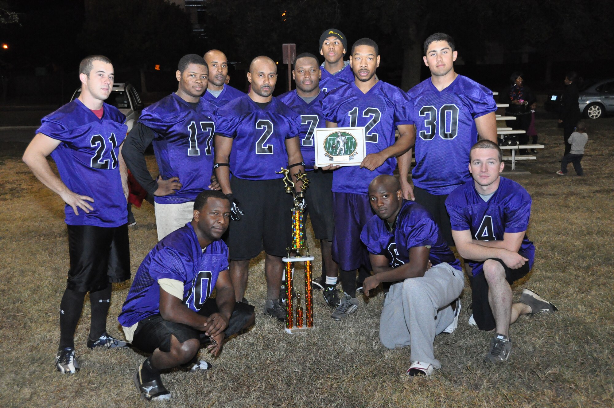 The 403rd flag football team is awarded the second-place trophy during the Keesler Air Force Base flag football championship game Nov 4. (U.S. Air Force photo by/Master Sgt. Brian Lamar)