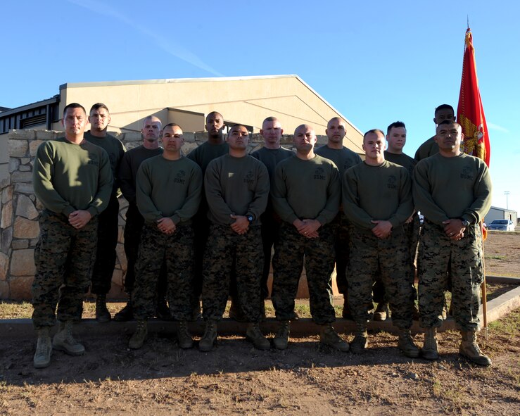 U.S. Marines from Detachment 1, Motor Transport Maintenance Company participated in a 239 mile run to commemorate the U.S. Marine Corps 239th birthday Nov. 10, 2014, at Dyess Air Force Base, Texas. The Marines carried the Marine Corps flag throughout the run.  (U.S. Air Force photo by Airman 1st Class Alexander Guerrero/Released)