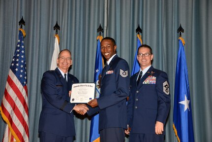 U.S. Air Force members at Joint Base San Antonio receive their Community College of the Air Force degrees Nov. 7, at a ceremony in the Fleenor Auditorium at Joint Base San Antonio-Randolph.  CCAF is federally-chartered degree-granting institution that serves the United States Air Force’s enlisted total force.  (U.S. Air Force photo/Desiree Palacios)