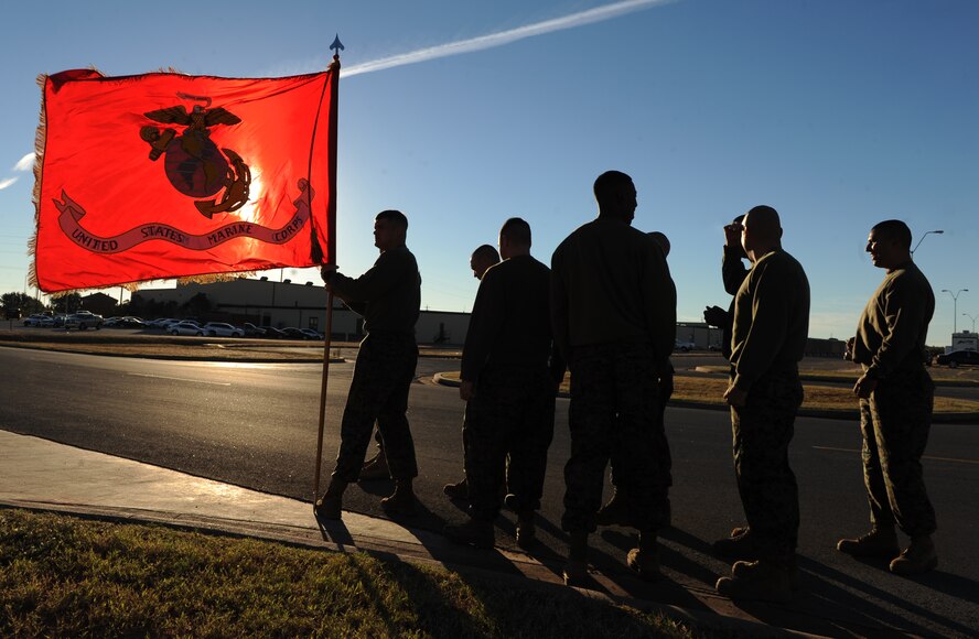 U.S. Marines from Detachment 1, Motor Transport Maintenance Company, prepare to run in formation in honor of the Marine Corps’ 239th birthday, Nov. 10, 2014, at Dyess Air Force Base, Texas. The detachment ran 239 miles over the course of five days. (U.S. Air Force photo by Airman 1st Class Alexander Guerrero/Released)