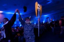 Chief Master Sgt. John Weimer, 5th Bomb Wing command chief, walks to the stage during the Global Strike Challenge score posting event on Barksdale Air Force Base, La., Nov. 5, 2014. Participants in the 2014 GSC included Air Force Global Strike Command's six wings plus units from Air Combat Command, Air Force Reserve Command and the Air National Guard. (U.S. Air force photo/Senior Airman Brittany Y. Bateman)