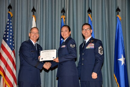 U.S. Air Force members at Joint Base San Antonio receive their Community College of the Air Force degrees Nov. 7, at a ceremony in the Fleenor Auditorium at Joint Base San Antonio-Randolph.  CCAF is federally-chartered degree-granting institution that serves the United States Air Force’s enlisted total force.  (U.S. Air Force photo/Desiree Palacios)
