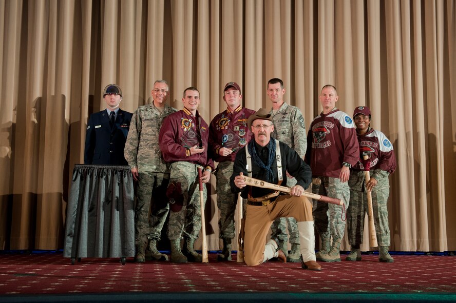 The 91st Missile Wing celebrates after winning best intercontinental ballistic missile mechanical and pneudralics team, during the Global Strike Challenge score posting event on Barksdale Air Force Base, La., Nov. 5, 2014. Participants in the 2014 GSC included Air Force Global Strike Command's six wings plus units from Air Combat Command, Air Force Reserve Command and the Air National Guard (U.S. Air force photo/Senior Airman Brittany Y. Bateman)