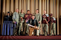 The 91st Missile Wing celebrates after winning best intercontinental ballistic missile electronics laboratory crew, during the Global Strike Challenge score posting event on Barksdale Air Force Base, La., Nov. 5, 2014. Participants in the 2014 GSC included Air Force Global Strike Command's six wings plus units from Air Combat Command, Air Force Reserve Command and the Air National Guard. (U.S. Air force photo/Senior Airman Brittany Y. Bateman)