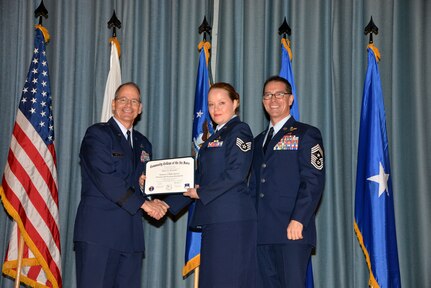 U.S. Air Force members at Joint Base San Antonio receive their Community College of the Air Force degrees Nov. 7, at a ceremony in the Fleenor Auditorium at Joint Base San Antonio-Randolph.  CCAF is federally-chartered degree-granting institution that serves the United States Air Force’s enlisted total force.  (U.S. Air Force photo/Desiree Palacios)