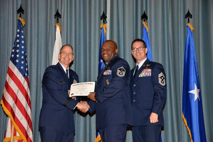 U.S. Air Force members at Joint Base San Antonio receive their Community College of the Air Force degrees Nov. 7, at a ceremony in the Fleenor Auditorium at Joint Base San Antonio-Randolph.  CCAF is federally-chartered degree-granting institution that serves the United States Air Force’s enlisted total force.  (U.S. Air Force photo/Desiree Palacios)
