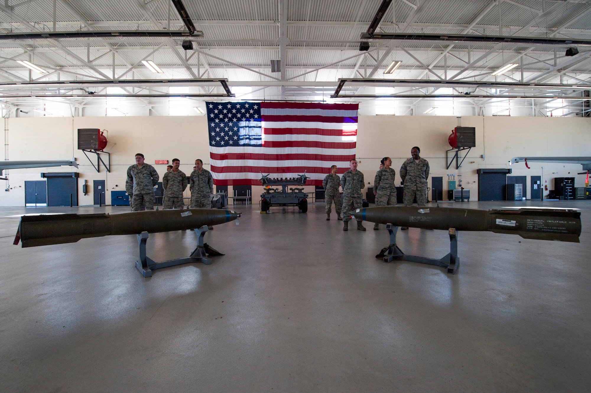Weapons load teams from the 74th and 75th Aircraft Maintenance Units strategize before a quarterly weapons load competition Nov. 7, 2014, at Moody Air Force Base, Ga. The two teams competed to load a GBU-12 Paveway II laser-guided bomb, a MK82 Air Inflatable Retarder bomb and an AIM-9 Sidewinder missile onto an A-10C Thunderbolt II. (U.S. Air Force photo by Airman 1st Class Dillian Bamman/Released)