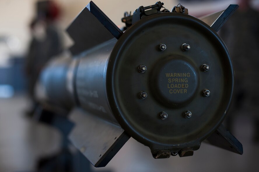 An MK82 Air Inflatable Retarder bomb sits on display before a quarterly weapons load competition Nov. 7, 2014, at Moody Air Force Base, Ga. In addition to MK82s, GBU-12 Paveway II laser-guided bombs and AIM-9 Sidewinder missiles were used for the competition. (U.S. Air Force photo by Airman 1st Class Dillian Bamman/Released)