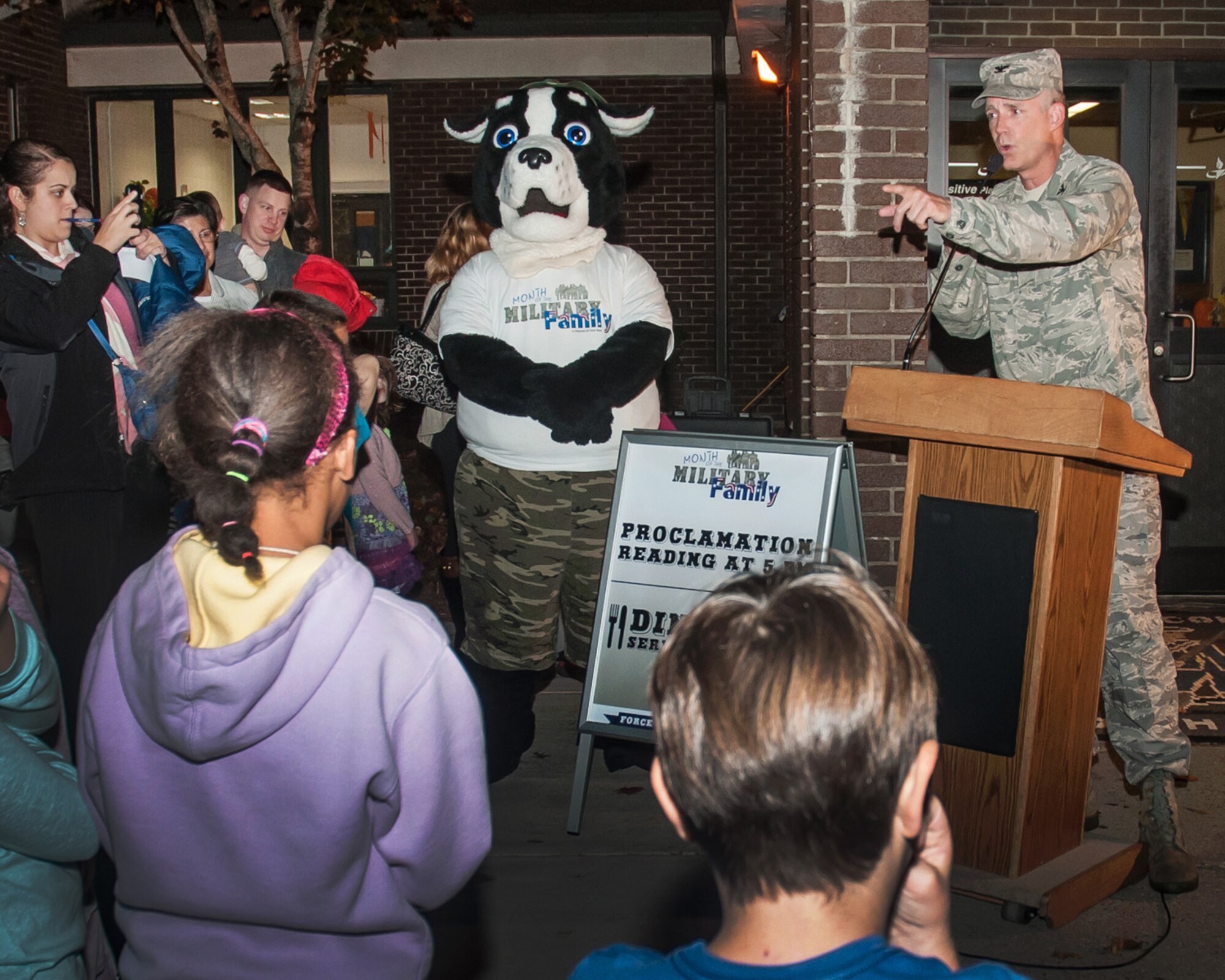 Col. Michael A. Vogel, 66th Air Base Group commander, reads a presidential proclamation celebrating the Month of the Military Family at the Youth Center Nov. 5. Each year the president signs a proclamation declaring November as Military Family Month. This annual proclamation marks the beginning of a month-long celebration of the military family in which the Department of Defense and the nation honor the commitment and sacrifices made by the families of the nation's servicemembers. (U.S. Air Force Photo by Jennifer Green-Lanchoney)