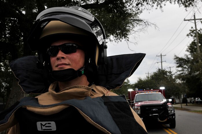 Staff Sgt. Edward Garwick, 628th Civil Engineer Squadron, explosive ordinance technician, wears a protective bomb suit as he participates in the Veteran's Day Parade Nov. 8, 2014, in Charleston, S.C. Joint Base Charleston had more than 90 members participate in a large formation along with 45 other military oriented groups from the local area. (U.S. Air Force photo/Staff Sgt. Renae Pittman)