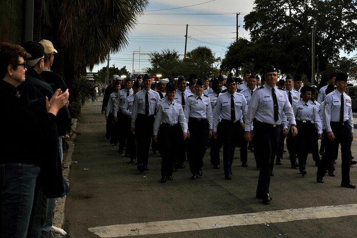 Members of Joint Base Charleston participate in the Veterans Day Parade Nov. 8, 2014, in Charleston, S.C. More than 90 Airmen and Sailors from JB Charleston participated in the 1.2 mile parade through the historic downtown streets of Charleston. (U.S. Air Force photo/Staff Sgt. Renae Pittman)