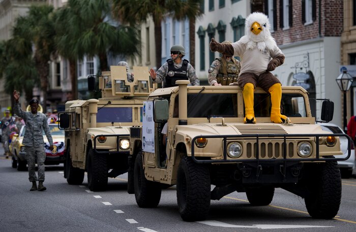 Members of Joint Base Charleston’s 1st Combat Camera Squadron and 628th Security Forces Squadron participate in the Ralph H. Johnson Veterans Hospital Annual Veterans Day parade Nov. 8, 2014, in Charleston, S.C. The origins of the holiday date back to President Woodrow Wilson, who proclaimed Armistice Day to mark the end of World War I. The armistice between Germany and the Allied nations that ended WWI was signed on that day and a ceasefire went into effect on the 11th hour of the 11th day of the 11th month in 1918. (U.S. Air Force photo/Airman 1st Class Clayton Cupit)
