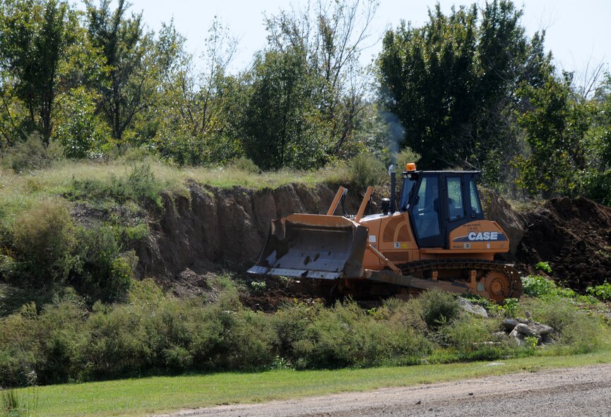 Tech. Sgt. Samuel Miller operates the front-end loader during a bivouac training exercise at Ebbing Air National Guard Base, Fort Smith, Ark., Oct. 4, 2014. (U.S. Air National Guard photo by Airman 1st Class Cody Martin/released)