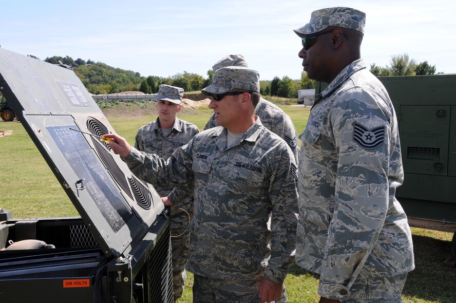 Airmen with the 188th Civil Engineering Squadron conduct a bivouac exercise in which they trained on a multitude of skills at Ebbing Air National Guard Base, Fort Smith, Ark., Oct. 5, 2014. (U.S. Air National Guard photo by Airman 1st Class Cody Martin/released)