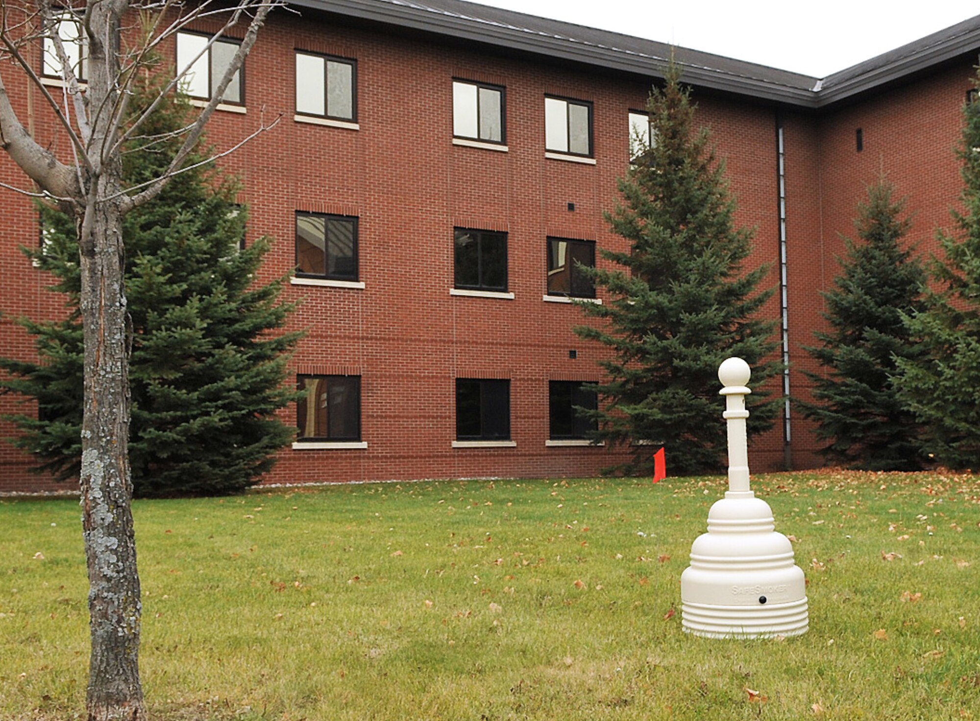 New designated tobacco areas on Grand Forks Air Force Base, N.D., will be marked with signs and already have receptacles set in place for cigarette butts. Tobacco users will be expected to keep the areas clean of cigarette butts and debris or the tobacco areas will be removed per AFI 40-102. (Air Force photo/Airman 1st Class Bonnie Grantham)