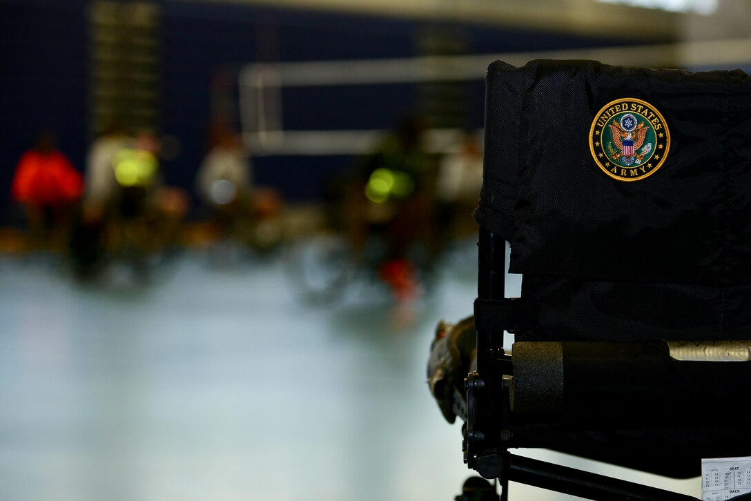 U.S. Army Soldiers from the Warrior Transition Unit participate in wheelchair basketball as part of Warrior Care Month at Fort Eustis, Va., Nov. 6, 2014. Transition workshops, resiliency classes and morale events are several of the events scheduled throughout during Warrior Care Month. (U.S. Air Force photo by Senior Airman Kimberly Nagle/Released) 