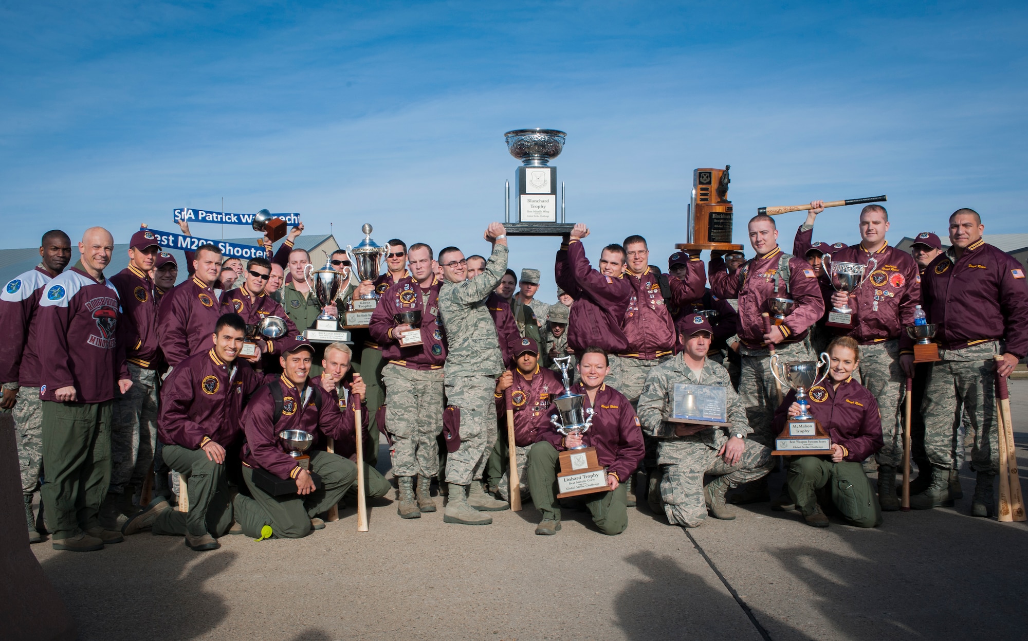 Airmen from the 91st Missile Wing pose with their trophies after returning from the Air Force Global Strike Challenge score posting on Barksdale Air Force Base, La.  Among their awards was the Blanchard Trophy, which is awarded to the best missile wing in the Air force. This was the second year in a row that Minot brought home the prestigious award. (U.S. Air Force photo/Senior Airman Stephanie Morris)